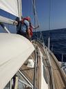 Raising the Italian flag as we enter territorial waters